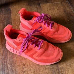 Coral Athletic Sneakers with Purple Laces